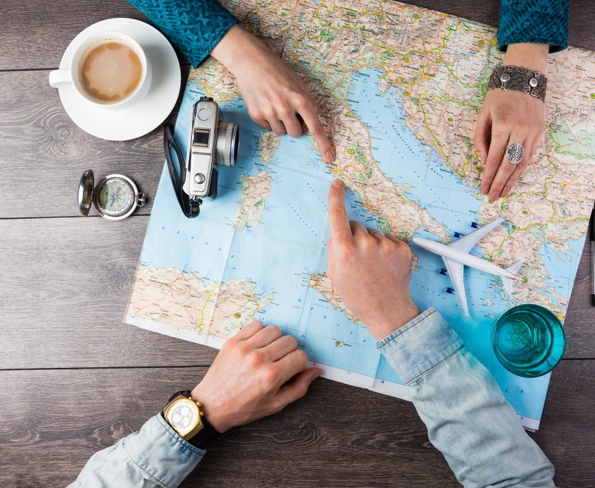 Travel planning with map and accessories
