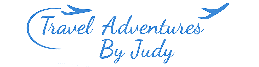 Logo with blue cursive text reading 'Advent By Judy'.